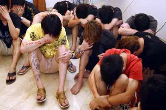 Police arrest dozens in China, Taiwan over phone scams