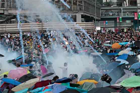 Hong Kong protesters defiant after tear gas chaos