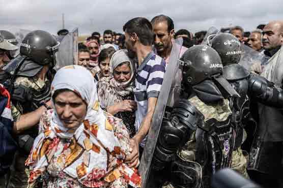 US-led strikes hit Syria's Raqa, Aleppo provinces 