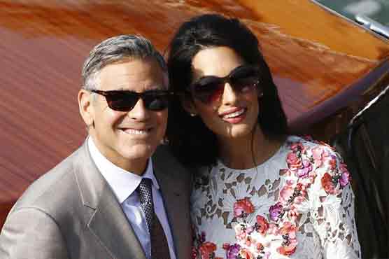 Newlywed Clooneys set to officialise 'perfect' wedding 