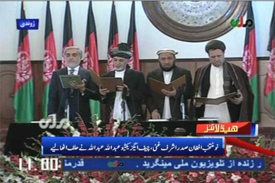 New Afghan President Ghani takes oath, seeks peace talks