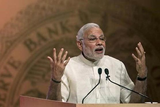 Modi urges India's banks to lend to debt-laden farmers