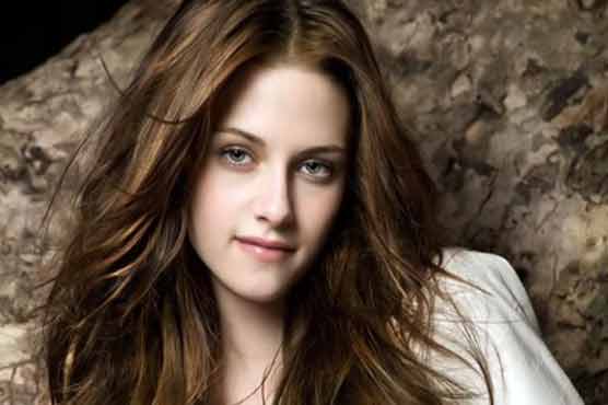 With a wink to 'Twilight,' Kristen Stewart speeds forward