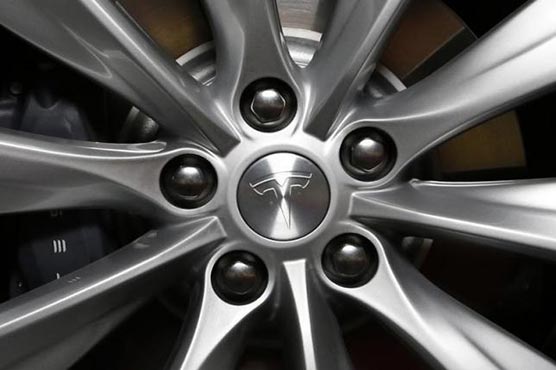 Tesla says delivered record 10,030 cars in first quarter