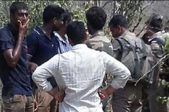 India police say 20 shot dead in clash with smugglers