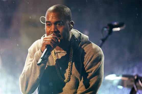 Rapper Kanye West settles lawsuit with photographer over scuffle