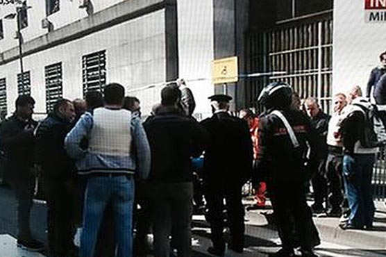 Italy court shooter arrested: minister