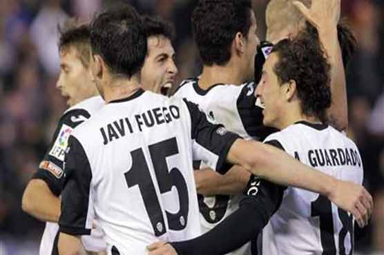 Football: Athletic Bilbao strike late to hold Valencia