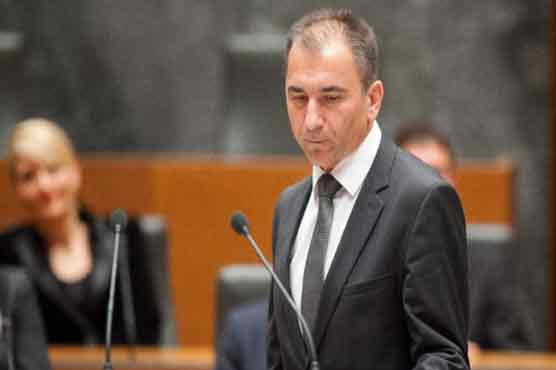 Slovenian defence minister forced out over telecom scandal