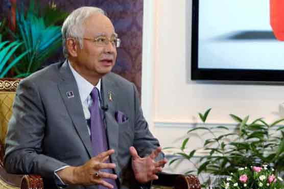 Malaysia PM defends himself against mounting criticism