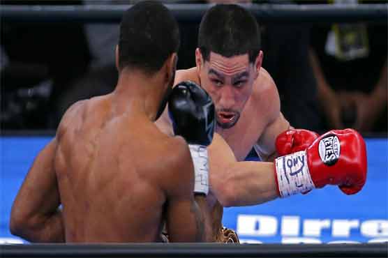 Boxing: Unbeaten Garcia wins close decision over Peterson