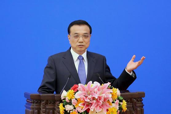 China premier says economy faces growing downward pressure