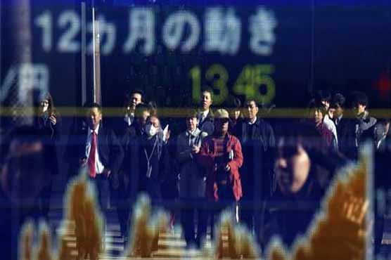 Global stocks mixed in muted trading after Wall Street fall