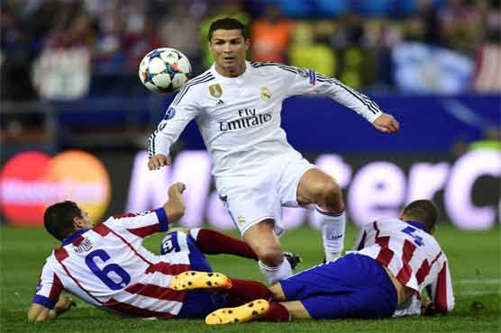 Football: Atletico extend unbeaten run over Real in stalemate