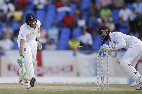 England stumble again but take first innings lead of 220