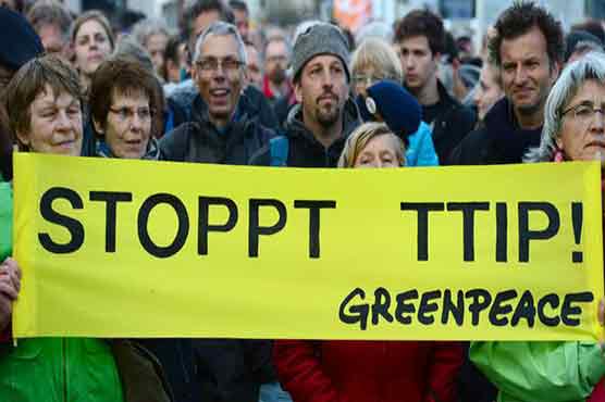 Thousands march in Europe against US-EU free trade pact