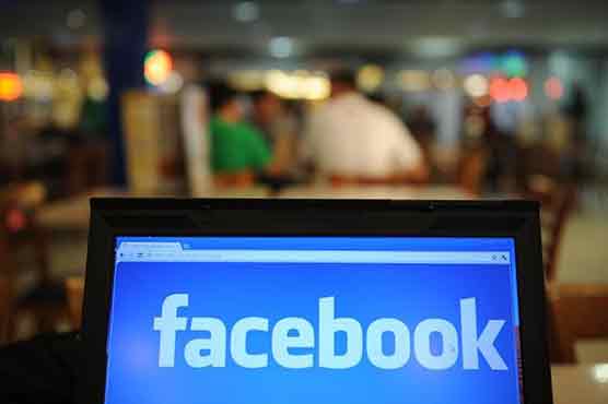 Facebook profit down but revenues, user base grow
