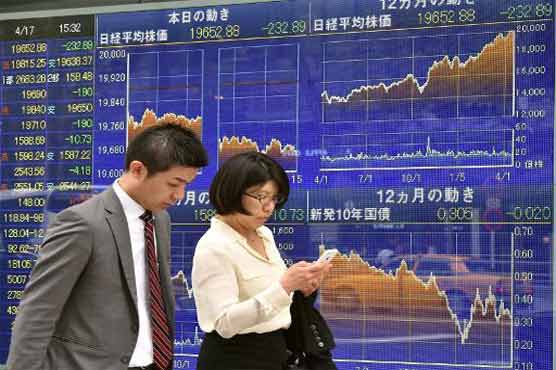 Asian stocks mostly down despite Wall St record