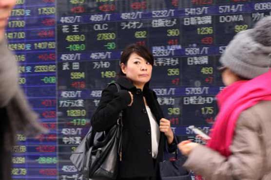 Asian stocks mostly down despite Wall St record