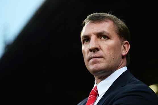 Football: Rodgers ready to concede defeat in top four fight