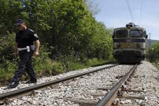 Argentine side train with dust masks as volcano spews ash