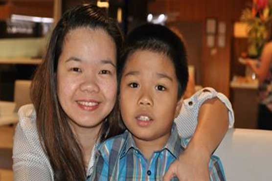 Thousands beg Australia not to deport autistic Filipino boy