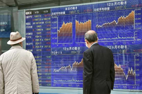 Asian stocks largely higher after Wall Street hits record