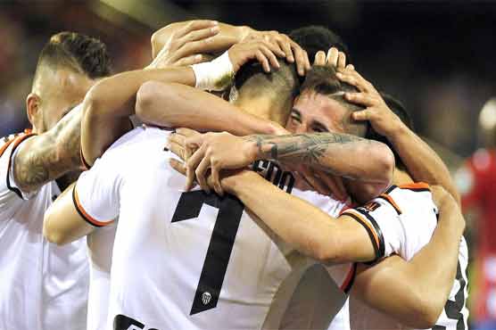 Valencia beat lowly Granada 4-0 in Spanish league