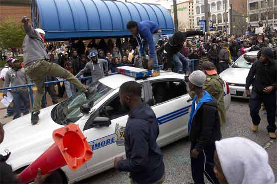 Riots, looting in Baltimore as protests turn violent