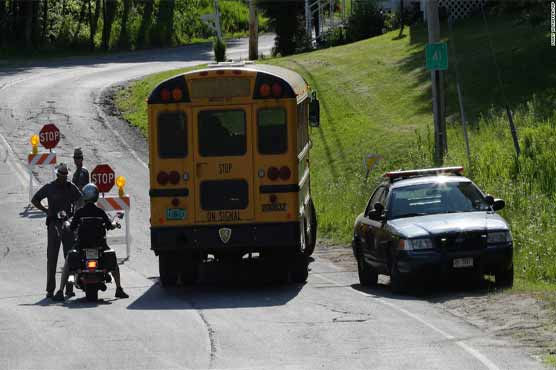 Manhunt after US police officer shot dead