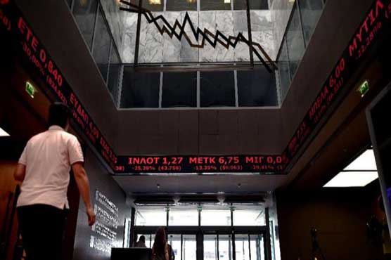 Greek stocks take historic beating as bourse reopens