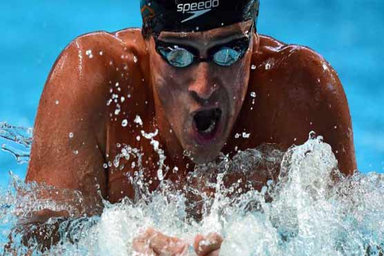 Swimming: Lochte writes history as Ledecky wins fourth gold