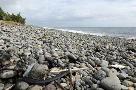 France begins hunt for more MH370 debris on Reunion