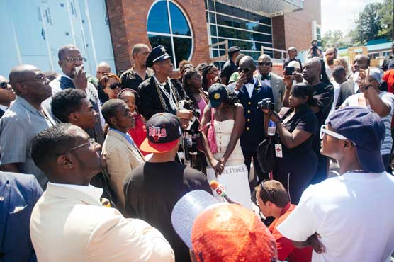 Multiple shots fired during clashes in Ferguson: report