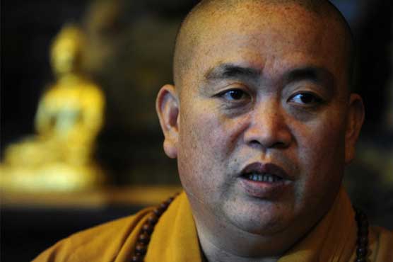 China media seek probe into claims against 'CEO monk'