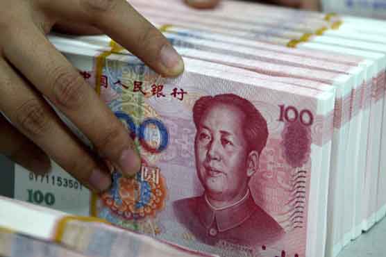 China cuts Yuan rate against US dollar for second day