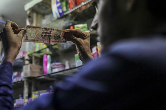 India inflation drops as factory output quickens