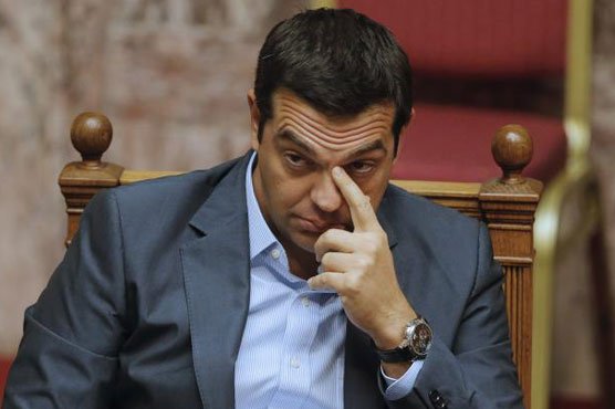 Greek PM faces revolt after eurozone approves huge bailout 