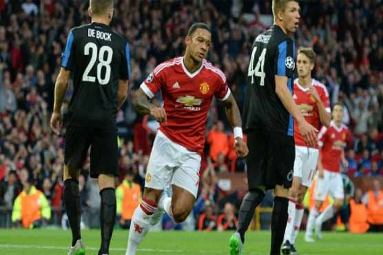 Football: Depay double gives Man United play-off edge