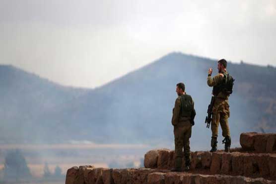 Israel responds to Syria rocket fire with artillery, air strikes