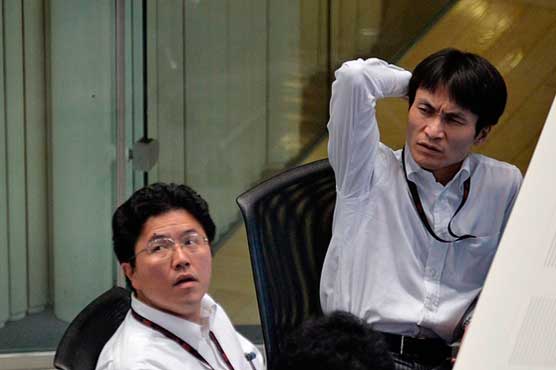 Tokyo stocks drop 2.1% by break on global economy fears