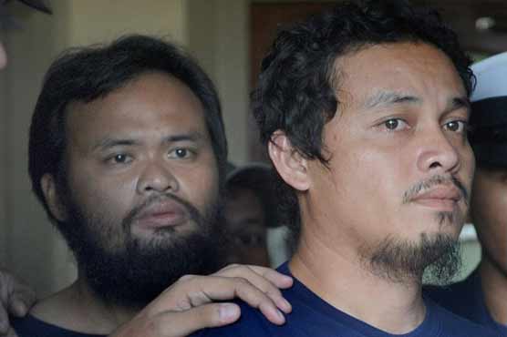 Trembling Philippine hostages recall escape from captivity