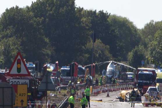 Pilot fights for life after 7 killed in UK airshow crash