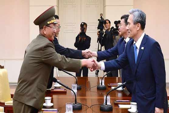 Koreas in marathon talks to end military standoff