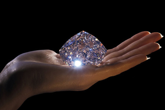 De Beers cuts diamond prices to boost demand 