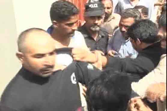 Scuffle breaks out as police raid factory in Faisalabad