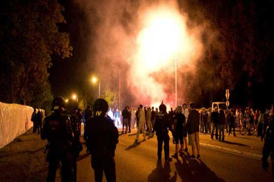 German court reinstates ban on demos in flashpoint refugee town