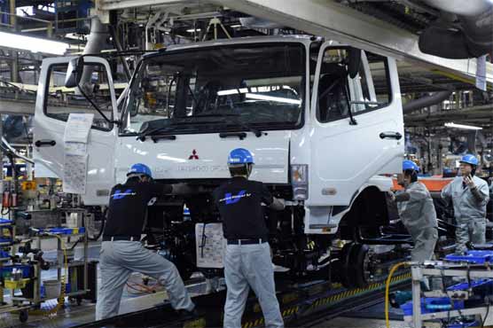 Japan factory output turns down in July as China demand slumps 