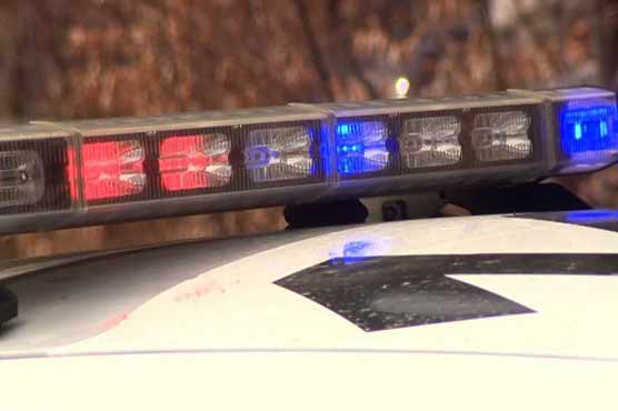 Armed teenager running toward school shot by police officer