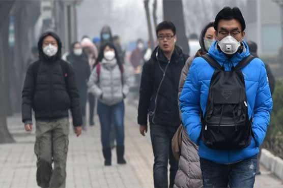 Beijing slashes traffic in pollution red alert 